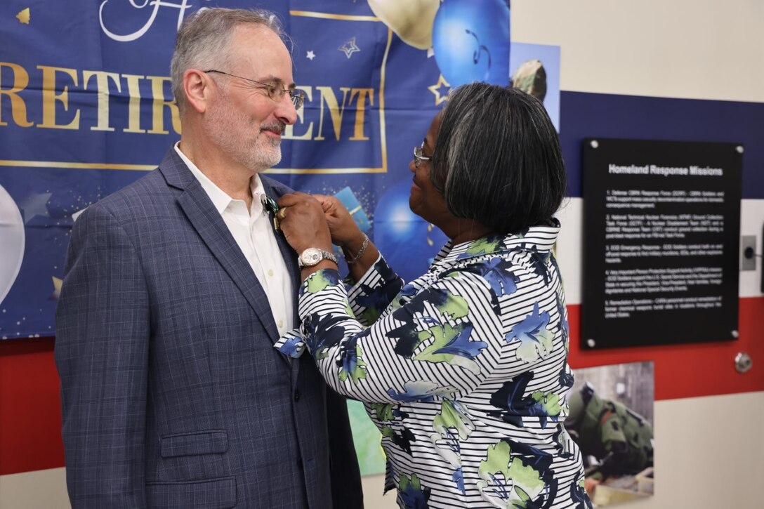 Civilian Senior Communications Mission Planner retires from service after 41 years