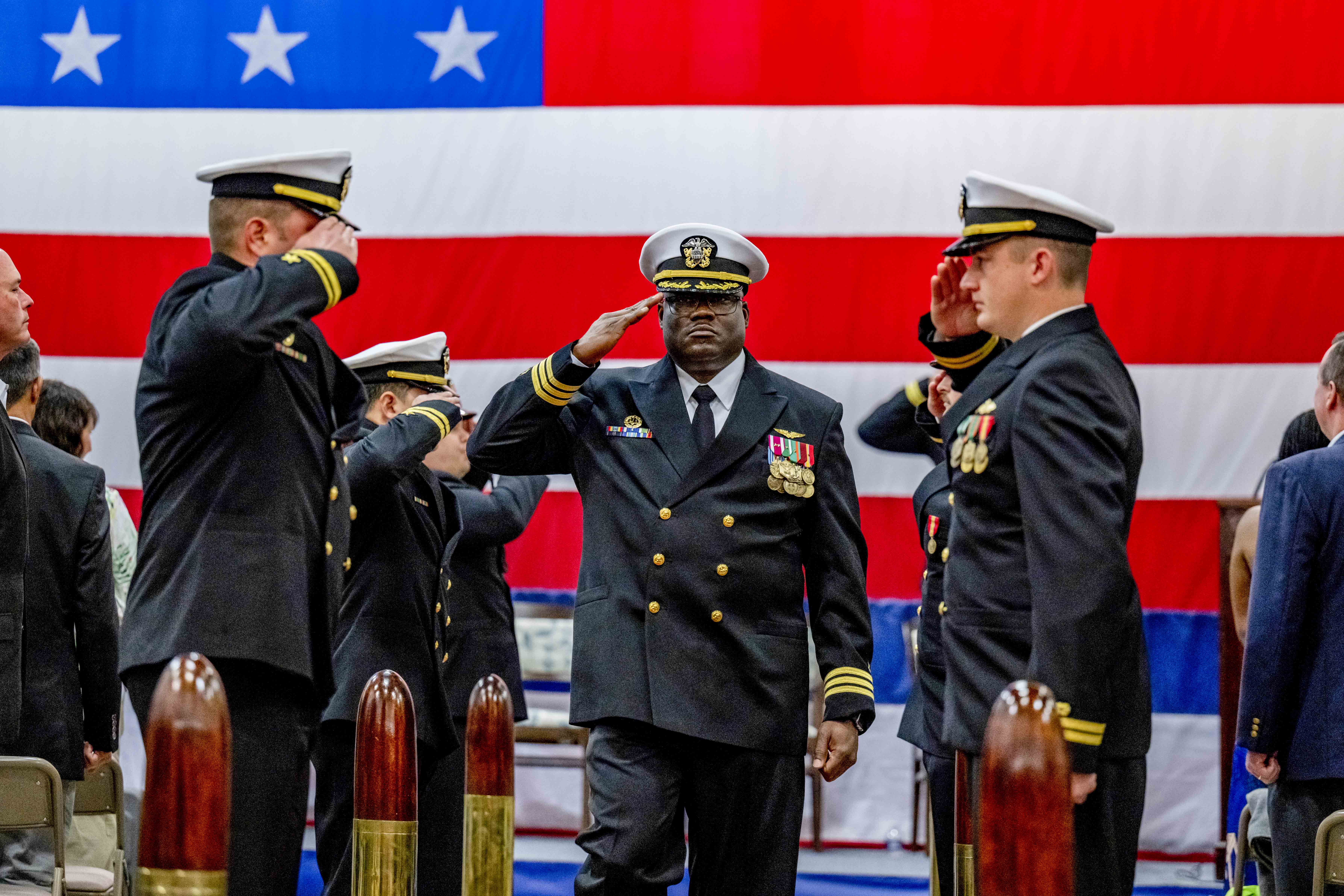 CHANGE OF COMMAND: Naval Support Activity Panama City Commanding Officer Captain Keith B. Foster turned over command to Commander Michael K. Mosi at the change of command ceremony, February 22.