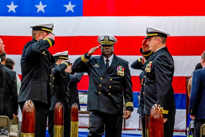 CHANGE OF COMMAND: Naval Support Activity Panama City Commanding Officer Captain Keith B. Foster turned over command to Commander Michael K. Mosi at the change of command ceremony, February 22.