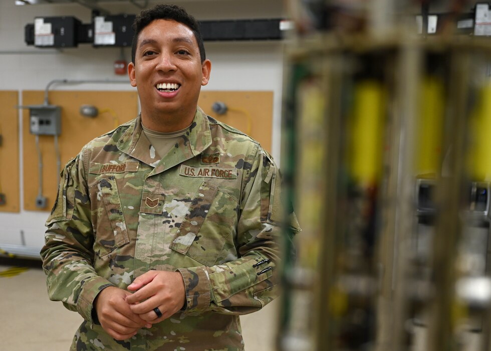 U.S. Air Force Staff Sgt. Christian Bufford, 312th Training Squadron Special Instruments Training instructor, explains what a decommissioned long period seismometer is, at Goodfellow Air Force Base, Texas, Feb. 21, 2023. Bufford has been in the Air Force for eight years, and arrived as an instructor at Goodfellow in June 2022. (U.S. Air Force photo by Staff Sgt. Abbey Rieves)