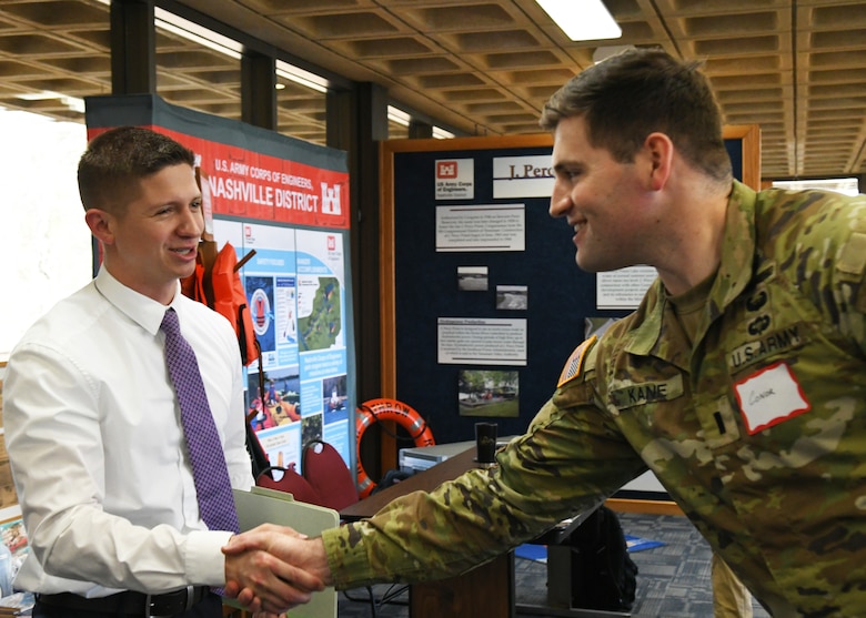 Operations Officer 1st Lt. Conor Kane greets potential hire, Navy Civil Engineer Dustin Burkett at the Nashville District job fair at J. Percy Priest Lake visitor center on February 23, 2023.
