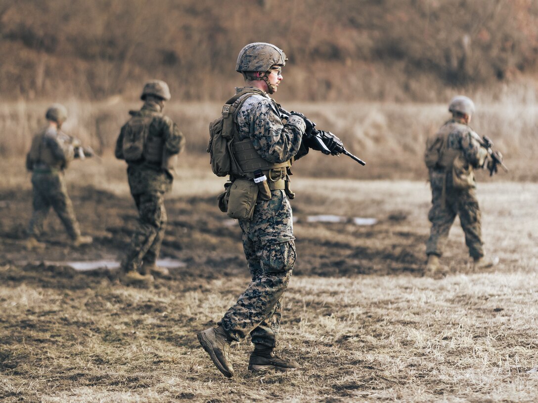 U.S. Marine Corps Sgt. Ethan Jara, a native of East Bethel, Minnesota and an ammunition technician with III Marine Expeditionary Force Support Battalion, III Marine Expeditionary Force Information Group, maneuvers his fire team on an Infantry Battle Platoon Course during a live fire range on U.S. Army Garrison Casey, Gyeonggi, South Korea, Feb. 10, 2023. III MSB is conducting Bushido Strike 23, which comprises training events including a Marine Corps Combat Readiness Evaluation in South Korea to validate its mission essential tasks of providing combat service, security and administrative services to III Marine Expeditionary Force. (U.S. Marine Corps photo by Staff Sgt. Manuel A. Serrano)