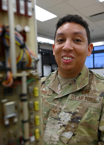 U.S. Air Force Staff Sgt. Christian Bufford, 312th Training Squadron Special Instruments Training instructor, stands near a decommissioned long period seismometer, at Goodfellow Air Force Base, Texas, Feb. 21, 2023. A long period seismometer detects surface waves, like the ones felt during an earthquake. (U.S. Air Force photo by Staff Sgt. Abbey Rieves)
