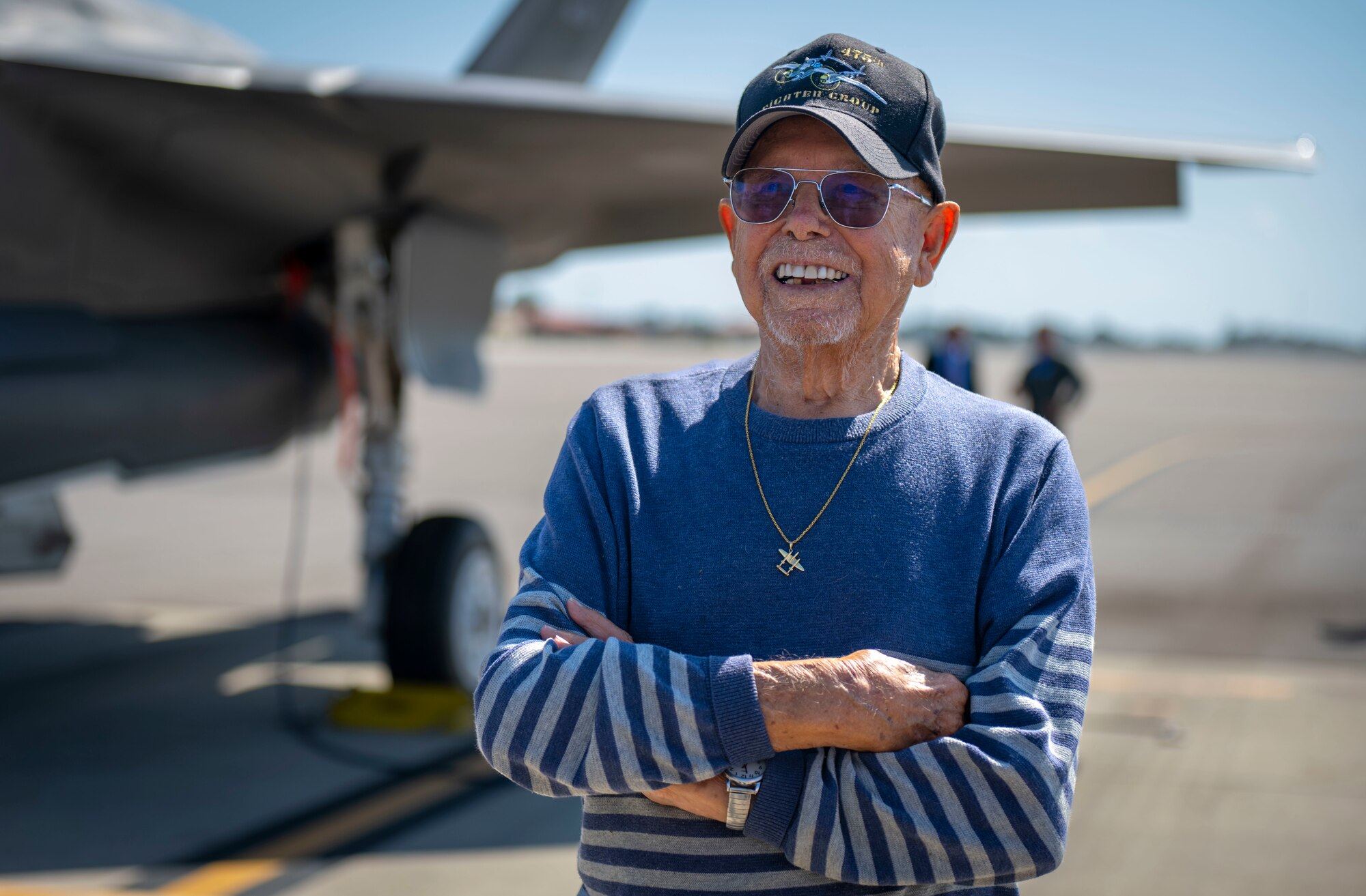 U.S. Air Force retired Col. "PJ" Dahl, a World War II P-38 Lightning Ace, celebrates his 100th birthday at MacDill Air Force Base, Florida, Feb. 17, 2023. During the celebration, Dahl toured the F-35A Lightning II aircraft and shared experiences with young pilots. (U.S. Air Force photo by Senior Airman Lauren Cobin)