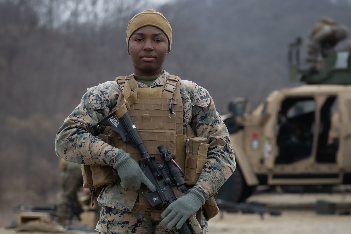 A Marine poses for a photo.