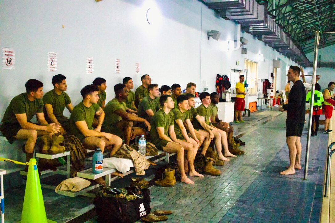 CATC Camp Fuji Marines receive instruction from Staff Sgt. Daniel Evans. Evans gave instructions in the Marine Corps Water Survival Program. (Courtesy Photo)