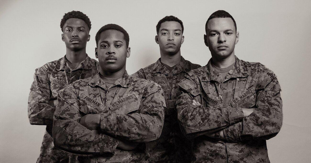 U.S. Marines with Headquarters and Support Battalion, Marine Corps Installations Pacific, and 3rd Marine Logistics Group, pose for a studio portrait during Black History Month on Camp Foster, Okinawa, Japan, Feb. 22, 2023. The month of February is designated as Black History Month to recognize the contributions and accomplishments of African Americans throughout American history. From the ranks of private first class through sergeant, Marines shared their past journeys leading up to their current successes in the Marine Corps and goals they have for the future. (U.S. Marine Corps photo by Lance Cpl. Jonathan Beauchamp)