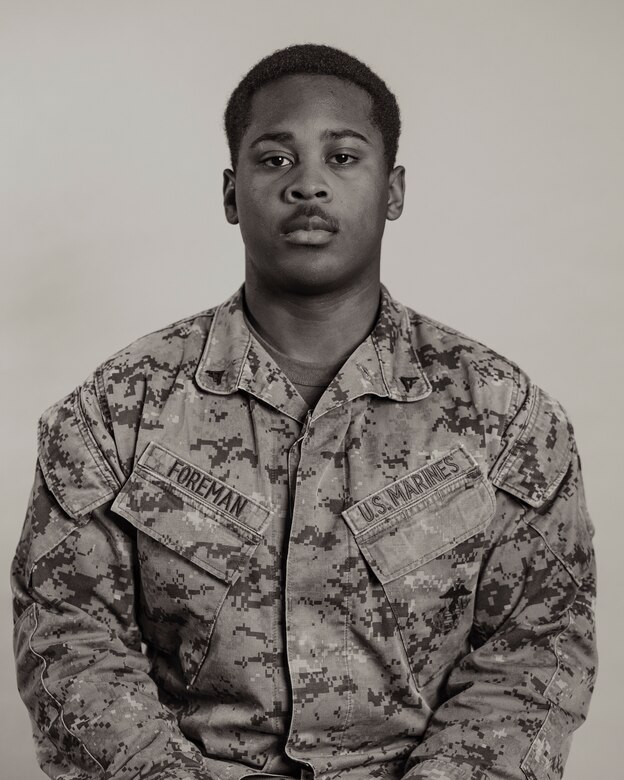 U.S. Marine Corps Lance Cpl. Camron Foreman, a data systems engineer with 3rd Network Battalion, Marine Corps Forces Cyberspace Command, poses for a studio portrait during Black History Month on Camp Foster, Okinawa, Japan, Feb. 22, 2023. The month of February is designated as Black History Month to recognize the contributions and accomplishments of African Americans throughout American history. From the ranks of private first class through sergeant, Marines shared their past journeys leading up to their current successes in the Marine Corps and goals they have for the future. (U.S. Marine Corps photo by Lance Cpl. Jonathan Beauchamp)