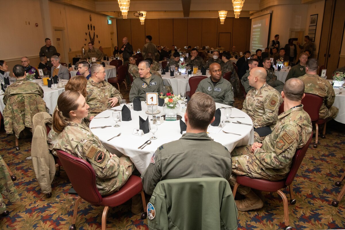U.S. Air Force Ch. (Maj. Gen.) Randall Kitchens (left), Department of the Air Force (DAF) chief of chaplains, along with Chief Master Sgt. Sadie Chambers (right), DAF religious affairs senior enlisted advisor, converse with Wolf Leadership Forum (WoLF) attendees at Kunsan Air Base, Republic of Korea, Feb. 24, 2023. Kitchens and WoLF participants attended a National Prayer Breakfast, an event that communicated the chaplain’s purpose and necessity of spiritual fitness to the mission. (U.S. Air Force photo by Senior Airman Akeem K. Campbell)