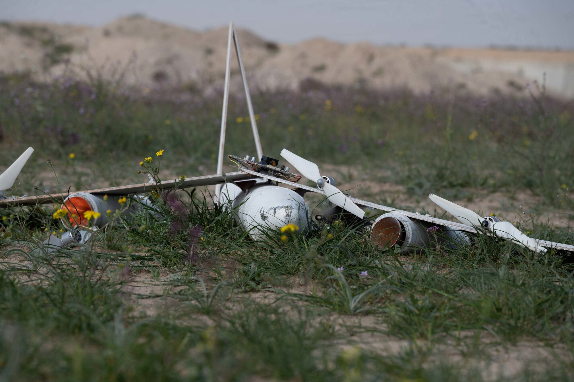 A mock downed Unmanned Aircraft System crashes during a UAS response exercise at Ali Al Salem Air Base, Kuwait, Feb. 21, 2023.