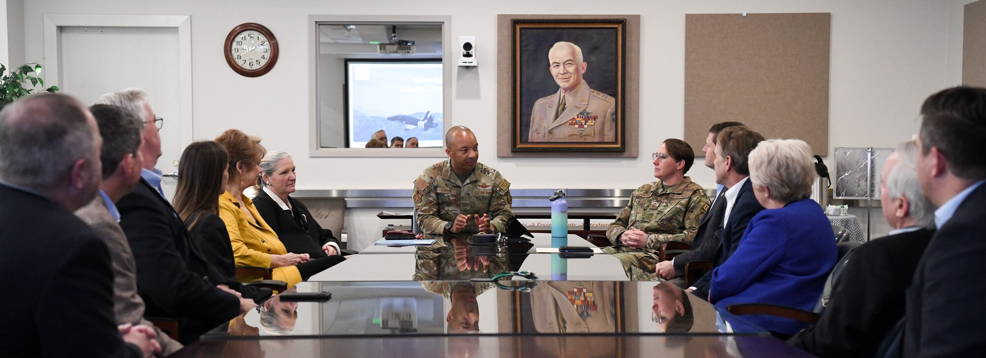 Air Force officer speaking to civilians