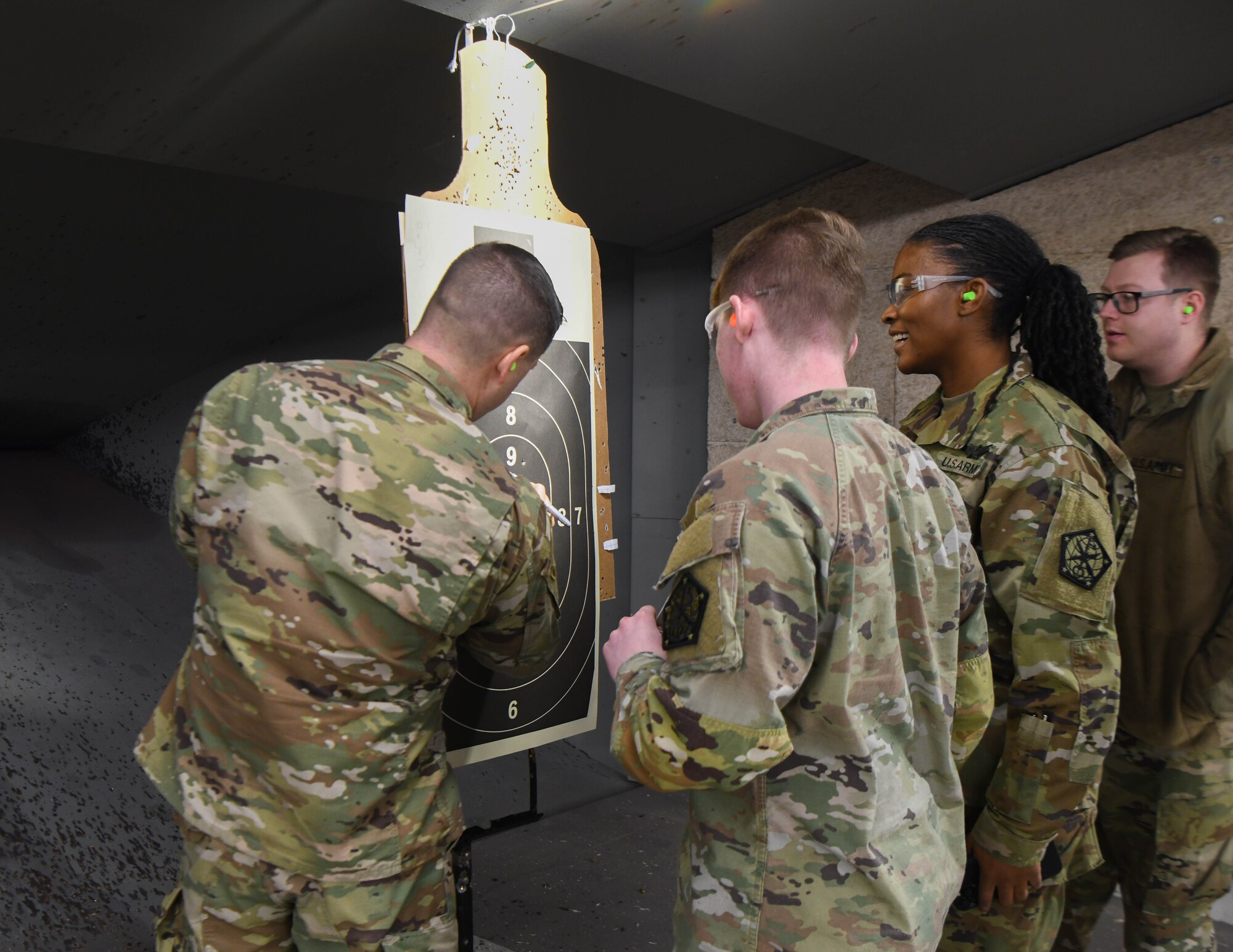 A group looks at a firing target
