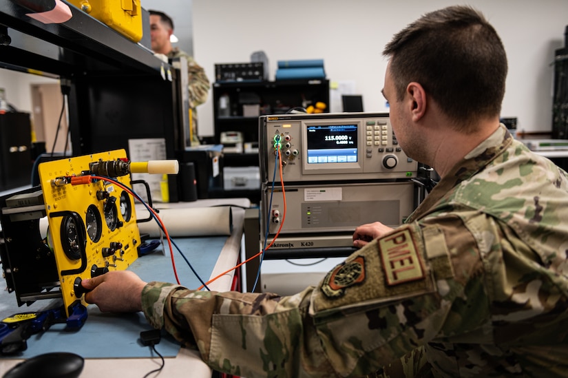 U.S. Air Force Airman 1st Class Colton Woodworth, 305th Maintenance Squadron Precision Measurement Equipment Laboratory technician, troubleshoots dials at Joint Base McGuire-Dix-Lakehurst, N.J., Feb. 23, 2023. PMEL technicians at JB MDL sustain the Joint Force by providing precise, reliable and traceable equipment to mission partners across the tri-state area. (U.S. Air Force photo by Senior Airman Sergio Avalos)