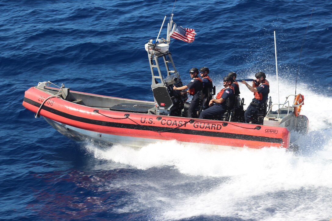 A USCGC Reliance (WMEC 615) boat crew performs non-compliant vessel training in the Caribbean Sea, Feb. 14, 2023. Reliance conducted a law enforcement patrol in support of Joint Interagency Task Force South in the Coast Guard's Seventh District area of operations. (U.S. Coast Guard photo by Petty Officer 3rd Class Jordan Baker)