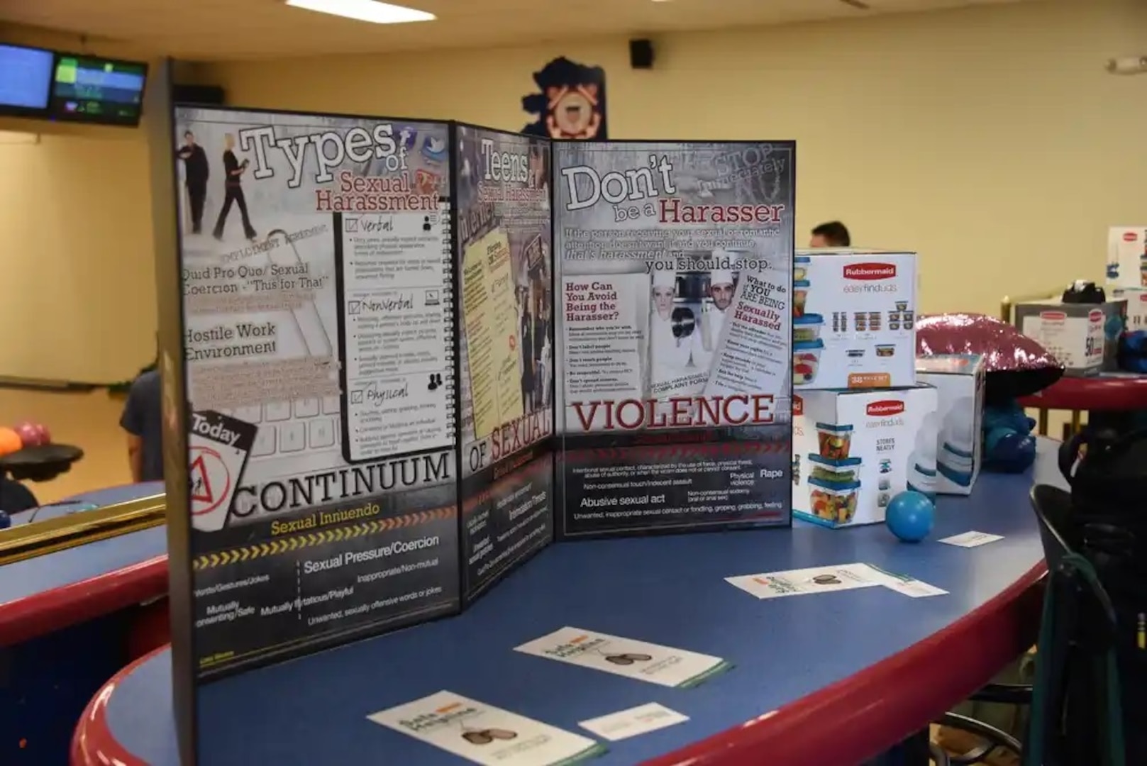 A sign is posted during an all-hands bowling event at Tsunami Lanes Bowling Alley at Base Kodiak, Alaska, April 4, 2019, to encourage and support victims of sexual assault or harassment to reach out to available resources in the Coast Guard. This event was part of Sexual Assault Awareness and Prevention Month and was accompanied by a cake-cutting ceremony with remarks from the base command and the sexual assault response coordinator in efforts to end sexual assault and harassment in the service. U.S. Coast Guard photo by Petty Officer 3rd Class Lauren Dean.