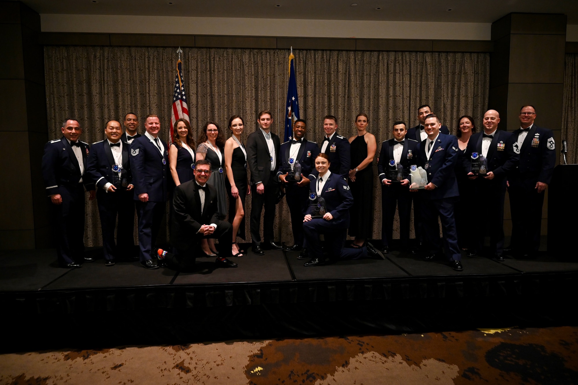 The annual award winners pose for a group photo at the end of the 350th Spectrum Warfare Wing's first annual awards ceremony at Eglin, Air Force Base, Fla., Feb. 24, 2023. The winners were chosen out of all the squadron and 29 nominees who were submitted. (U.S. Air Force photo by 1st Lt Benjamin Aronson)