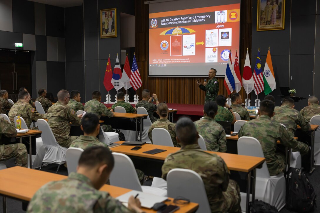 Col. Teerasak Krisnaseranee, a member of the Royal Thai Ministry of Defense, gives a brief on foreign military assets to allies and partners participating in a Humanitarian Assistance and Disaster Relief Table Top Exercise during Exercise Cobra Gold, Feb. 25, 2023, in Rayong province, Thailand.