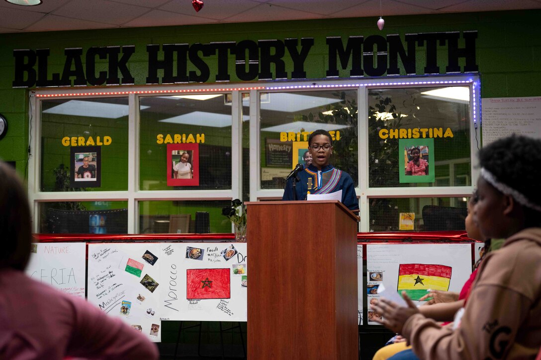 A member of the Joint Base Langley-Eustis Youth Program speaks at a Black History Month event at JBLE, Virginia, Feb. 22, 2023.