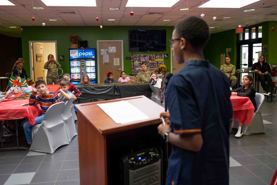 A member of the Joint Base Langley-Eustis Youth Program speaks at a Black History Month event at JBLE, Virginia, Feb. 22, 2023.