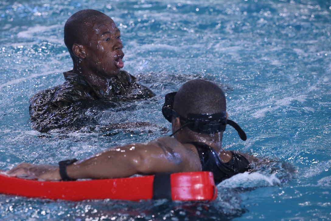 Recruits from Kilo Company, 3rd Recruit Training Battalion, conduct swim qualification remediation on Marine Corps Recruit Depot Parris Island, S.C., Dec. 15, 2021. Recruits who fail their initial swim qualification are required to return for additional training. (U.S. Marine Corps photo by Lance Cpl. Colin Harper)