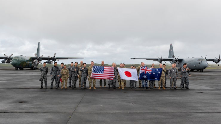 Group of military members pose for a photo
