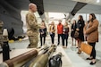 U.S. Air Force Master Sgt. Dustin Turner of the 123rd Explosive Ordnance Disposal Flight, briefs staff members from Kentucky’s Congressional Delegation about unit capabilities Feb. 17, 2023, at the Kentucky Air National Guard Base in Louisville, Ky. The staffers were touring the base to learn more about the mission sets of the Kentucky National Guard. (U.S. Air National Guard photo by Dale Greer)