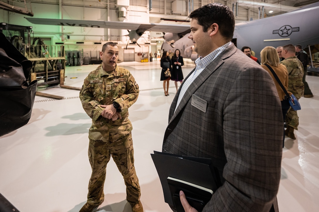 U.S. Air Force Master Sgt. Brian Milburn of the 123rd Contingency Response Group briefs Stephen Marks, director of veterans outreach for U.S. Sen. Andy Barr, about unit capabilities during a tour of the Kentucky Air National Guard Base in Louisville, Ky., Feb. 17, 2023. Marks and other staff members from Kentucky’s Congressional Delegation were visiting the base to learn more about the mission sets of the Kentucky National Guard. (U.S. Air National Guard photo by Dale Greer)