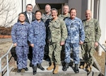 YOKOSUKA, Japan (Feb. 16, 2023) Senior leaders from the U.S. Navy, Japan Maritime Self-Defense Force (JMSDF), Royal Australian Air Force (RAAF) and Royal Australian Navy (RAN) pose for a photo following the trilateral theater anti-submarine warfare (TASW) working group (TTASWWG) at Commander, Fleet Activities Yokosuka. The TTASWWG helped improve information sharing, coordination, and communication between the three countries and across all domains of undersea warfare. (U.S. Navy photo by Mass Communication Specialist 2nd Class Arthur Rosen)