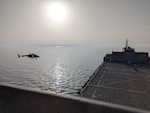 ARABIAN GULF (Feb. 23, 2023) A United Arab Emirates Armed Forces Bell 407 conducts deck landing qualifications aboard expeditionary sea base USS Lewis B. Puller (ESB 3) in the Arabian Gulf, Feb. 23, 2023. Puller is deployed to the U.S. 5th Fleet area of operations to help ensure maritime security and stability in the Middle East region.