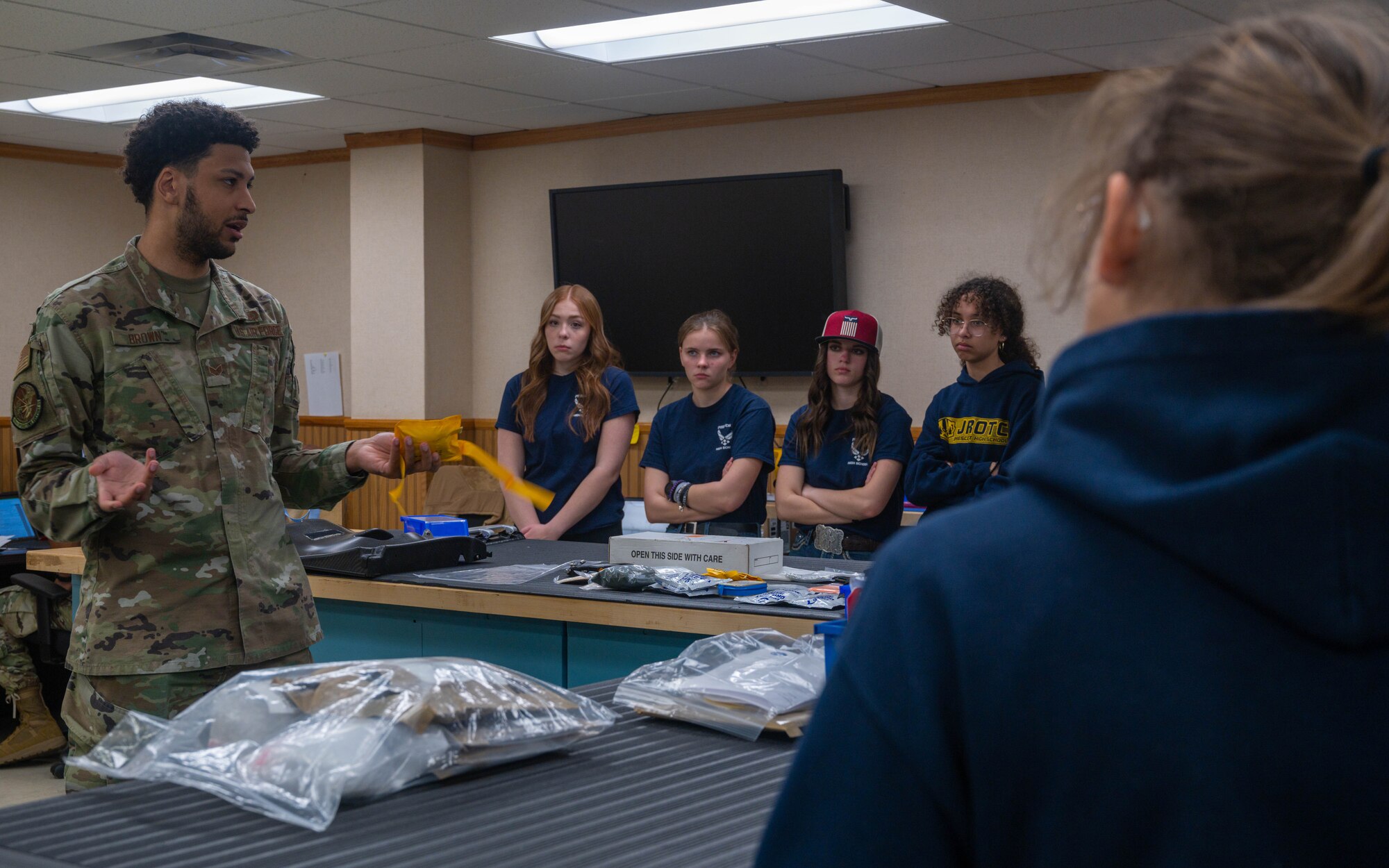 U.S. Air Force Senior Airman Shalik Brown, 56th Operations Support Squadron aircrew flight equipment manager, speaks to Prescott High School Air Force JROTC students, Feb. 21, 2023, at Luke Air Force Base, Arizona.