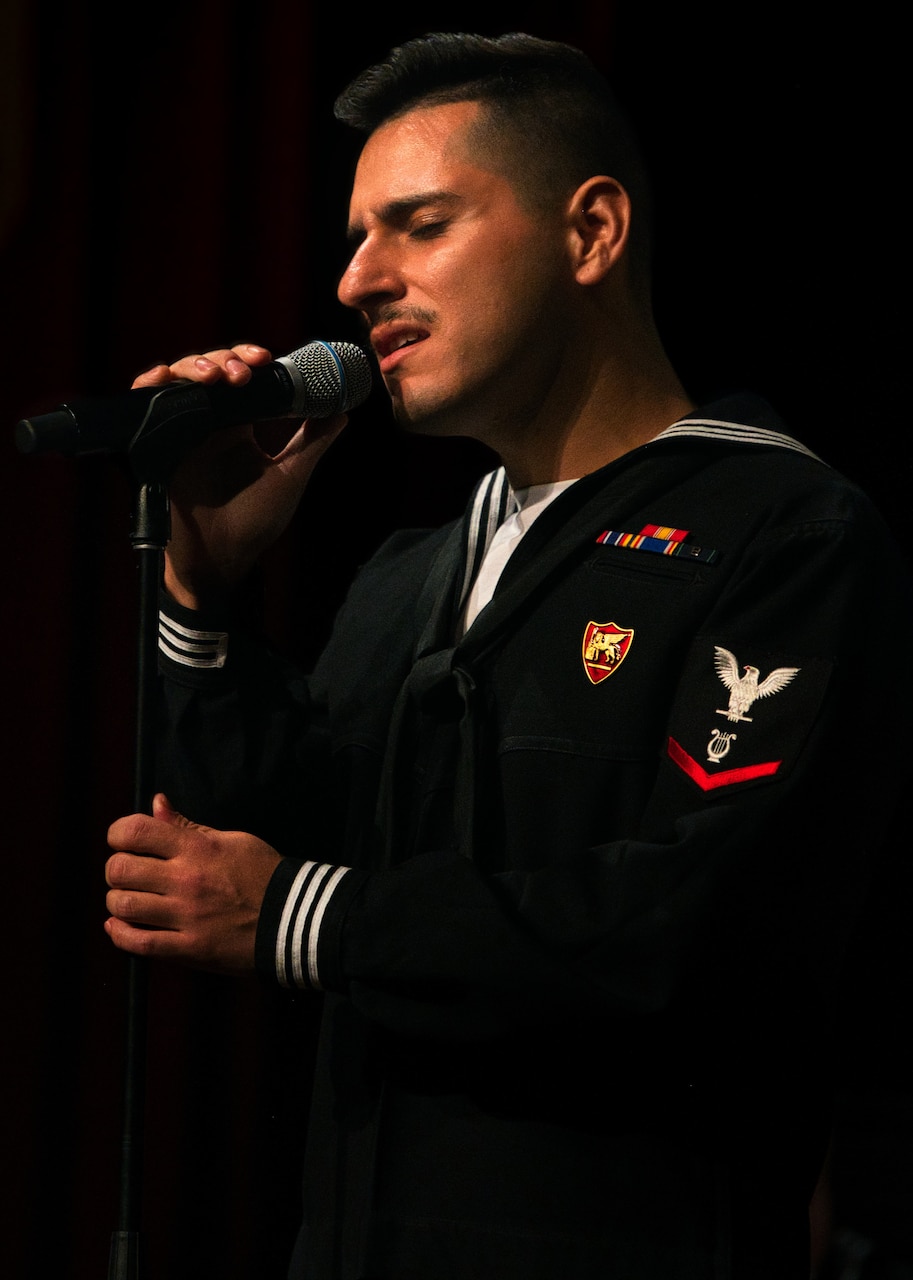 (Dec. 15, 2022) Musician 3rd Class Robert Novoa, member of the U.S. Naval Forces Europe-Africa (NAVEUR-NAVAF) Band, performs during a concert at Teatro Garibaldi in Santa Maria Capua Vetere, Italy, Dec. 15, 2022. NAVEUR-NAVAF operates U.S. naval forces in the U.S. European Command (USEUCOM) and U.S. Africa Command (USAFRICOM) areas of responsibility. U.S. Sixth Fleet is permanently assigned to NAVEUR-NAVAF, and employs maritime forces through the full spectrum of joint and naval operations.