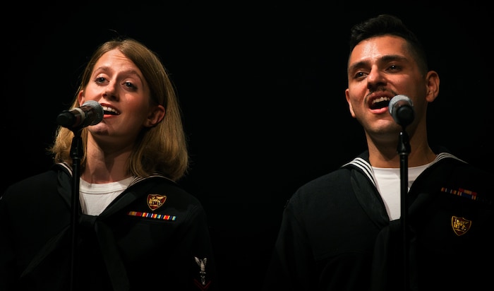 (Dec. 15, 2022) Musician 3rd Class Alyse Merry, left, and Musician 3rd Class Robert Novoa, members of the U.S. Naval Forces Europe-Africa (NAVEUR-NAVAF) Band, perform during a concert at Teatro Garibaldi in Santa Maria Capua Vetere, Italy, Dec. 15, 2022. NAVEUR-NAVAF operates U.S. naval forces in the U.S. European Command (USEUCOM) and U.S. Africa Command (USAFRICOM) areas of responsibility. U.S. Sixth Fleet is permanently assigned to NAVEUR-NAVAF, and employs maritime forces through the full spectrum of joint and naval operations.