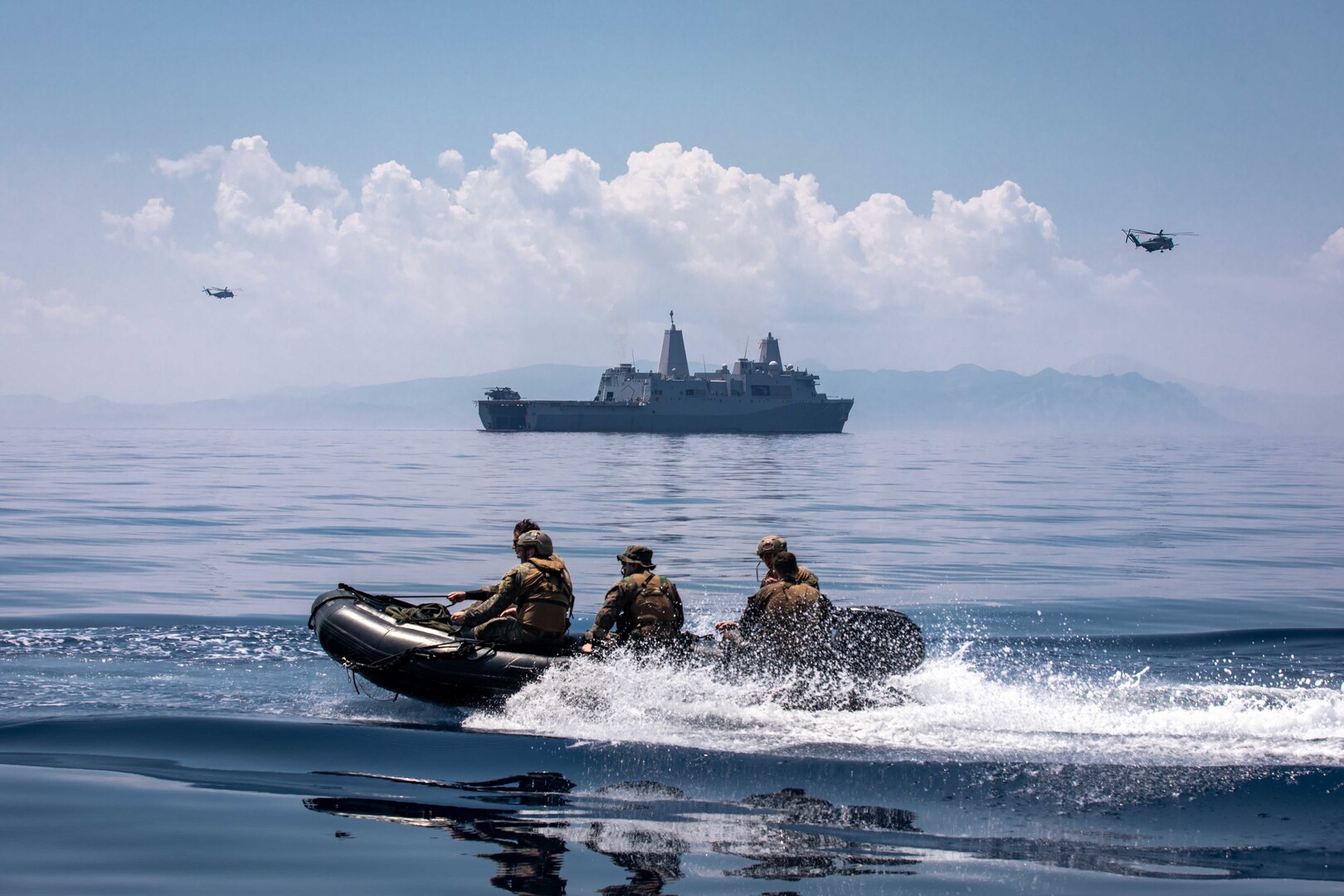 (May 16, 2022) U.S. Marines attached to the 22nd Marine Expeditionary Unit return to the San Antonio-class amphibious transport dock ship USS Arlington (LPD 24) in a combat rubber raiding craft after joint training with Hellenic Armed Forces off the coast of Skyros Island, Greece, May 16, 2022. Arlington, with embarked 22nd Marine Expeditionary Unit, is participating in exercise Alexander the Great 2022 under the command and control of Task Force 61/2. Alexander the Great 22 strengthens interoperability and force readiness between the U.S., Greece, and Allied nations, enhancing strategic defense and partnership while promoting security and stability in the region.