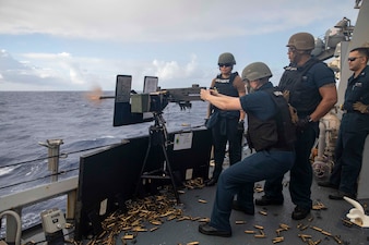 USS Decatur (DDG 73) conducts weapons training in the Philippine Sea.