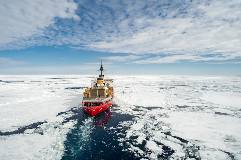 A Coast Guard cutter sails in icy waters.