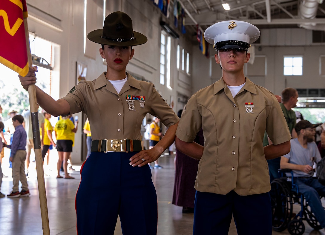 Pfc. Kylie Hathaway poses for a photo with her drill instructor at her graduation ceremony on Marine Corps Recruit Depot Parris Island S.C., May 27, 2022. Hathaway began training on the west coast at Marine Corps Recruit Depot San Diego and was transferred to MCRD Parris Island after an injury to her tibia required her to enter a recovery platoon. (U.S. Marine Corps photo by Lance Cpl. Michelle Brudnicki)