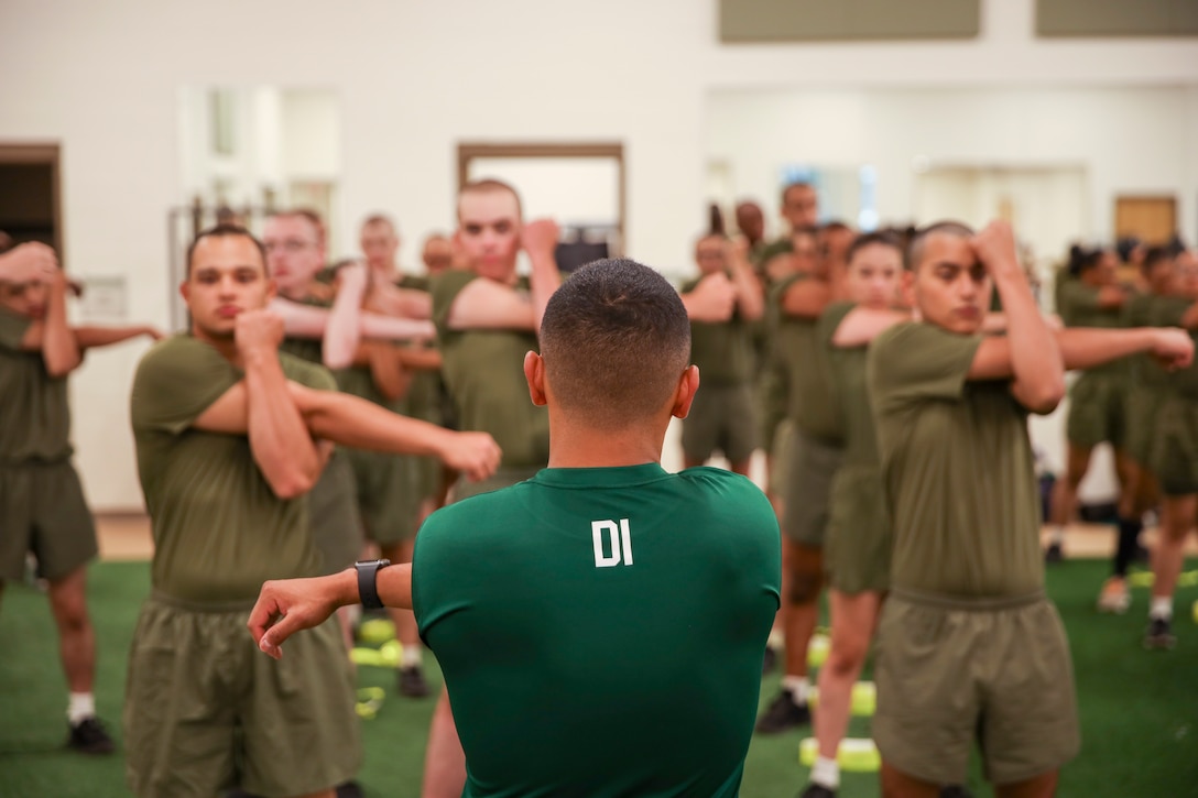 Recruits with Romeo Company, Support Training Battalion, participate in physical training on Marine Corps Recruit Depot Parris Island S.C., Sep. 28, 2022. Romeo Company, formerly known as Special Training Company, is a rehabilitation, recovery, and reconditioning company with the mission of getting recruits back to the fight. (U.S. Marine Corps Photo by Sgt. Ryan Hageali)