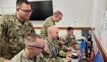 Soldiers from Army Space Support Team 22 with the 1158th Space Company, 117th Space Battalion, 1st Space Brigade, conduct a Table VIII certification at the 117th Readiness Facility on Fort Carson, Colorado, Nov. 4, 2022. From left are: Spc. Andy Hernandez-Solorio, Spc. Ryan Jenkins, Capt. Adam Smiley, Maj. Christopher Kremer, and Staff Sgt. Donovan Olson. Soldiers from the 1st Space Brigade provided space capabilities during  the Army's Project Convergence 2022, which took place across the Western United States from September to November.  (U.S. Army photo)