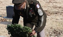Command Sgt. Maj. Finis A. Dodson, U.S. Army Space and Missile Defense Command’s senior enlisted Soldier, lays a wreath during his hometown’s Wreaths Across America event, Dec. 17, 2022, at Blocker Cemetery in Olive Branch, Miss. (U.S. Army photo by Jason B. Cutshaw)