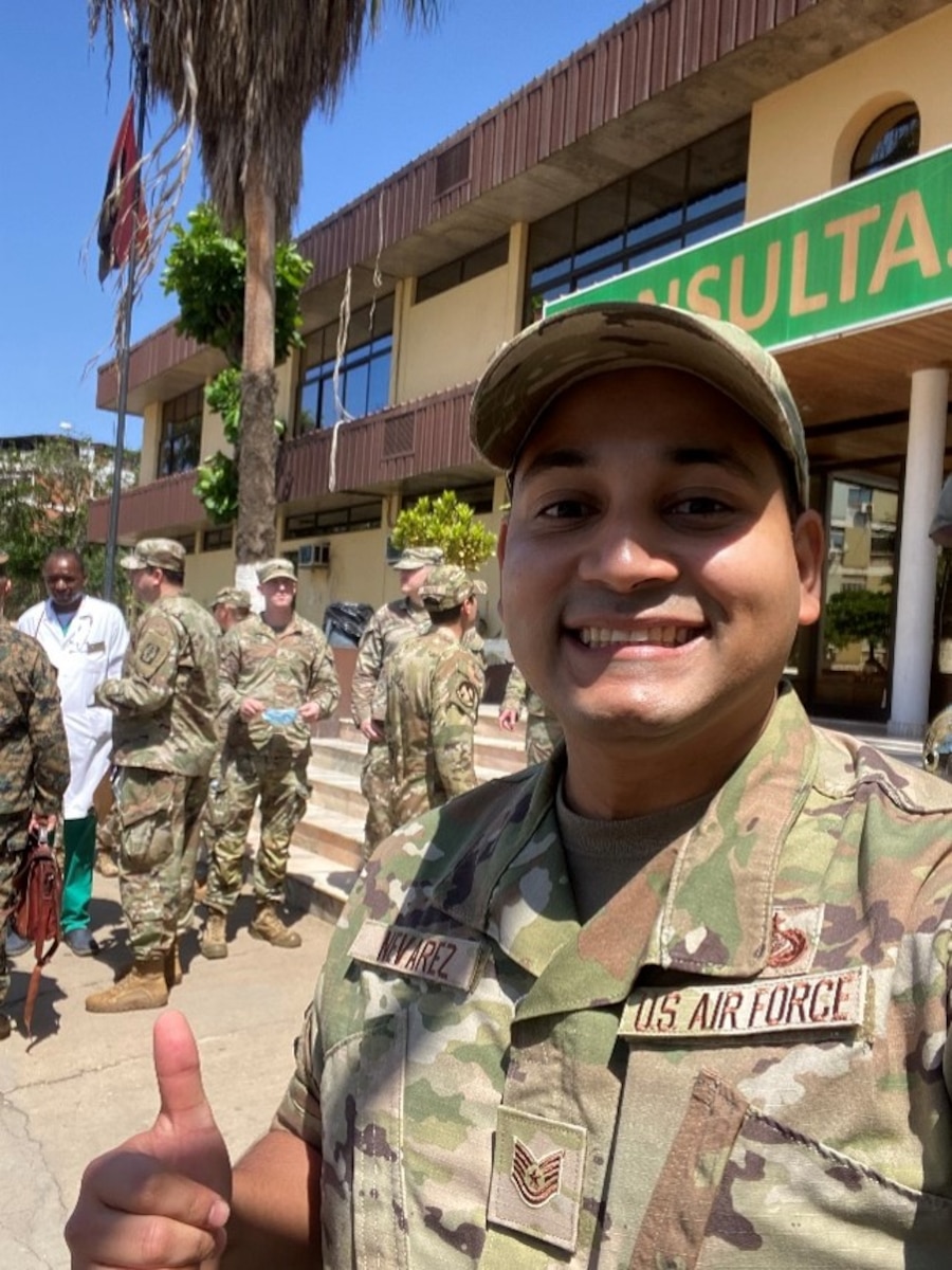 Airman posing in front of building in Angola