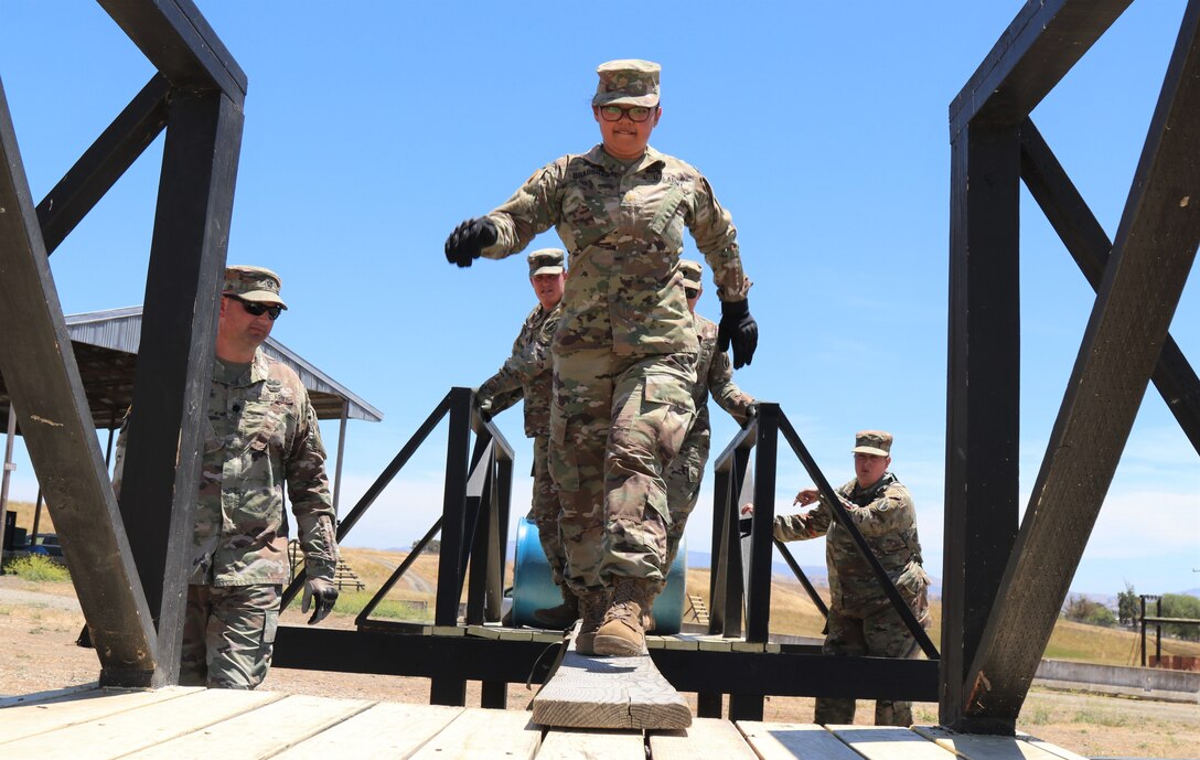 63rd Readiness Division Soldiers complete leadership reaction course during annual training