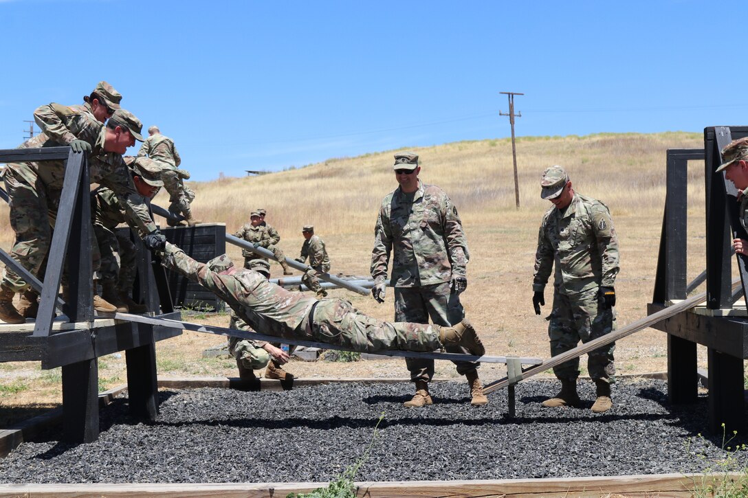 63rd Readiness Division Soldiers complete leadership reaction course during annual training