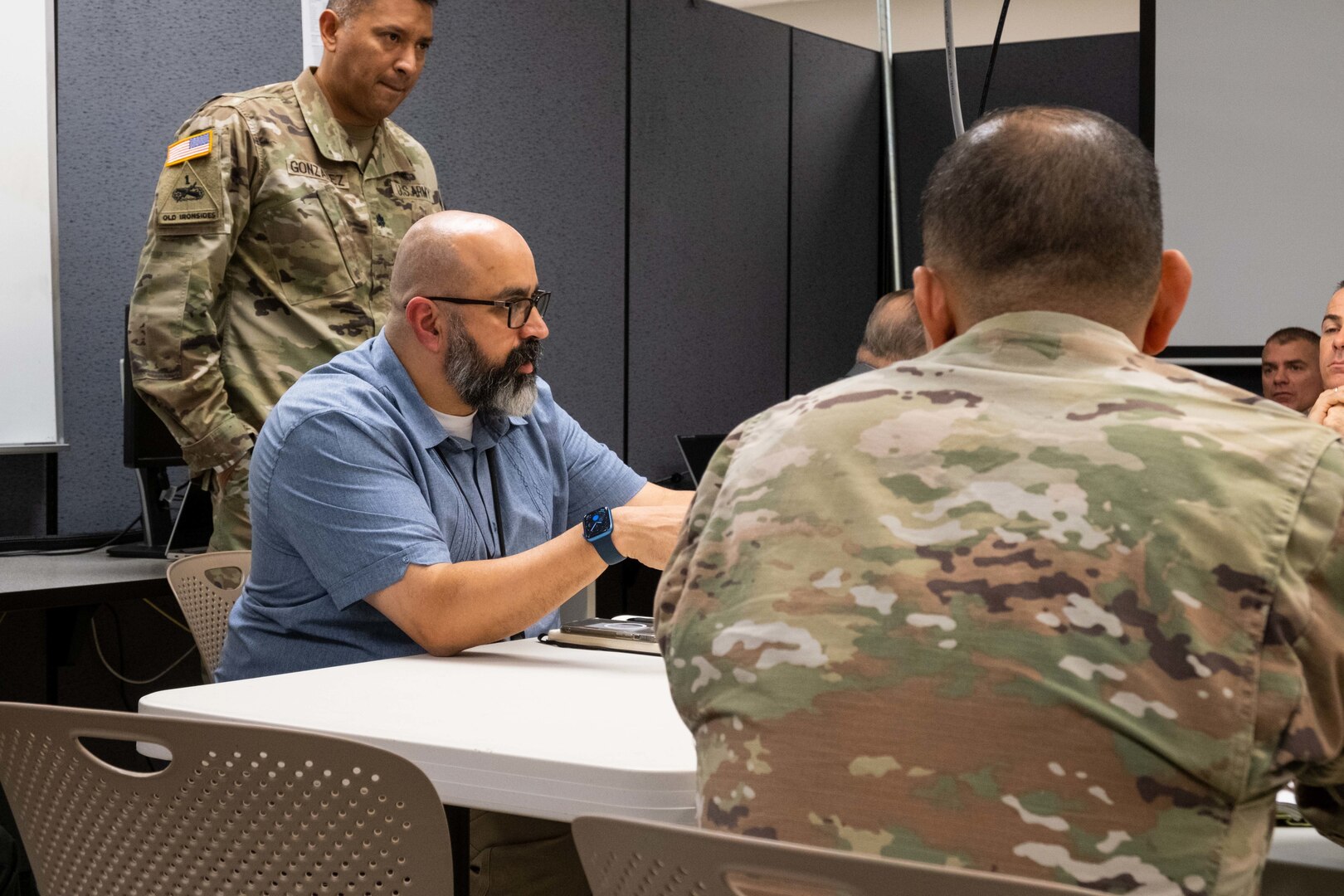 Pete Ramos, logistics management specialist at Army Medical Logistics Command, addresses other members of his working group during a workshop on Medical Logistics in Campaigning and its impact on the National Guard and Reserve at Fort Sam Houston, Texas, Nov. 29.