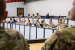 Pete Ramos, logistics management specialist at Army Medical Logistics Command, addresses other members of his working group during a workshop on Medical Logistics in Campaigning and its impact on the National Guard and Reserve at Fort Sam Houston, Texas, Nov. 29.