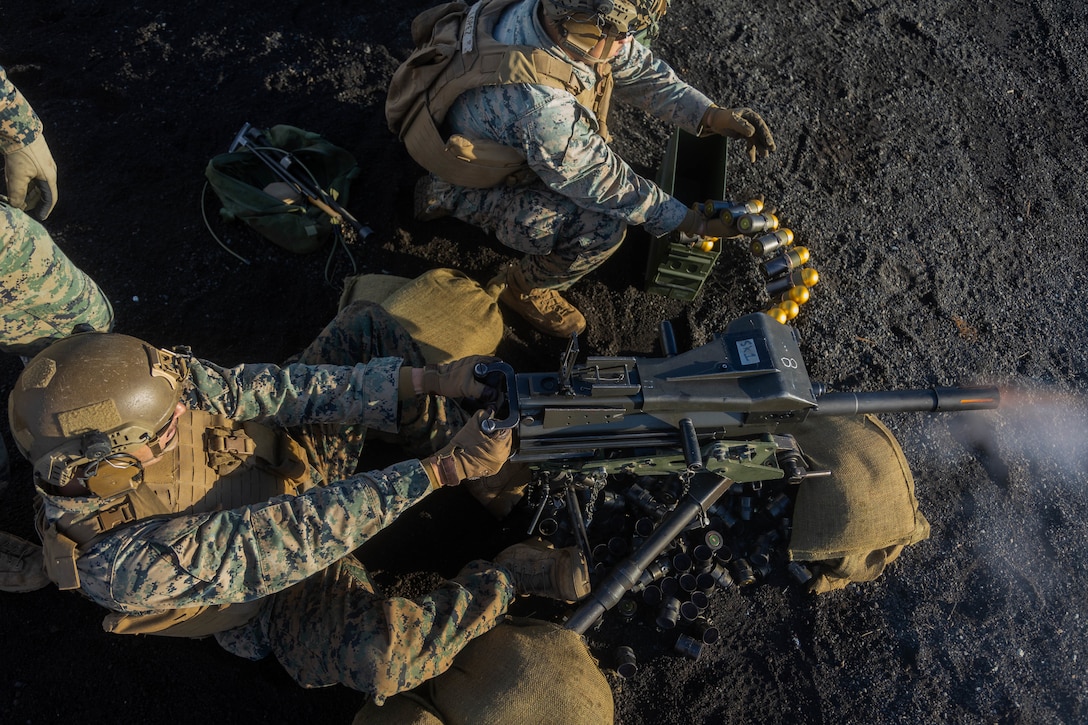 U.S. Marines with 1st Battalion, 2d Marines fire a Mark 19 40 mm grenade machine gun during Fuji Viper 23.1 at Combined Arms Training Center, Camp Fuji, Japan, Dec. 6, 2022. Exercise Fuji Viper exemplifies a commitment to realistic training that produces lethal, ready, and adaptable forces capable of decentralized operations across a wide range of missions. 1/2 is forward deployed in the Indo-Pacific under 4th Marines, 3d Marine Division as part of the Unit Deployment Program.