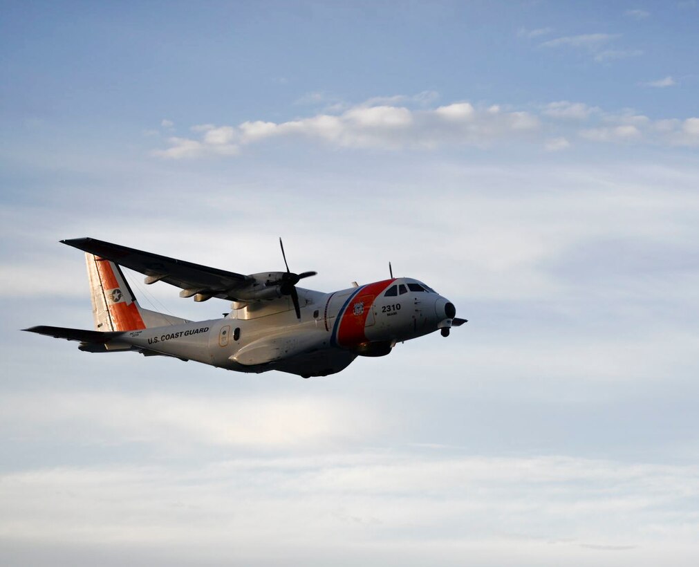 A Coast Guard Air Station Miami HC-144 Ocean Sentry aircrew searches for nine people missing in the water near Lake Worth Beach, Florida, Dec. 20, 2022. The nine people missing were reportedly traveling from Cuba in a homemade raft with 10 people.