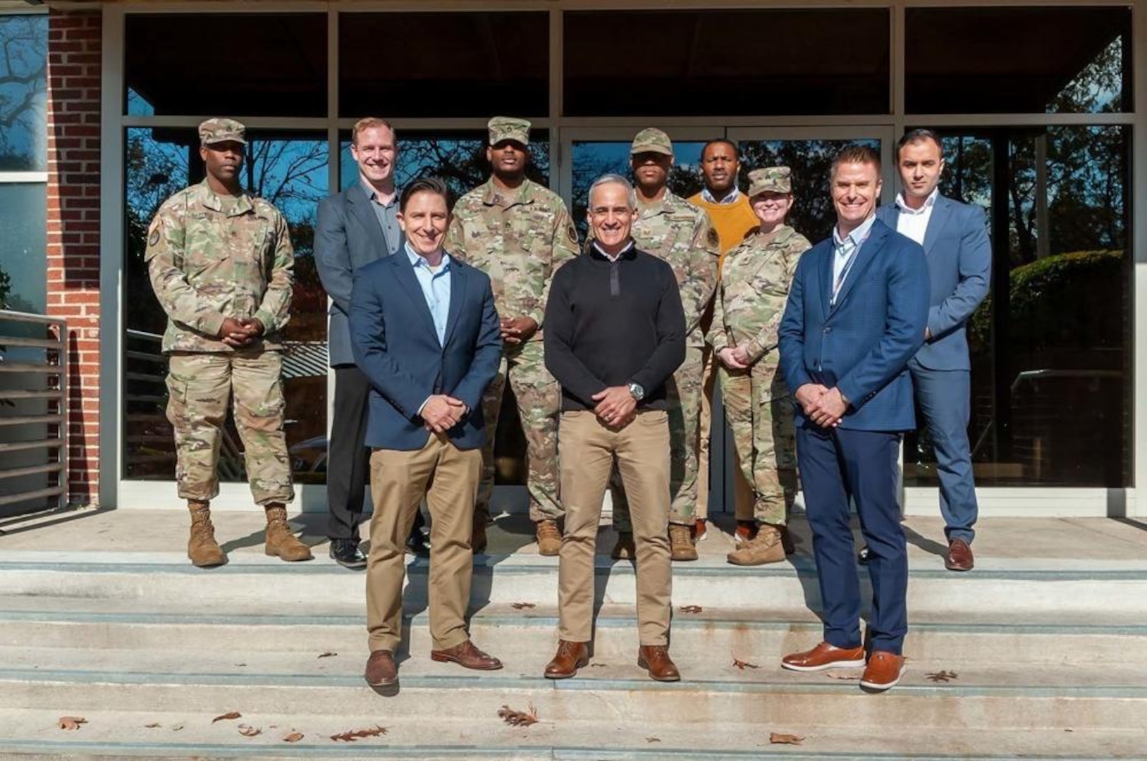 Senior Enlisted Leader to the Chairman of the Joint Chiefs of Staff and JPRA Enlisted Leaders stand together on the steps of JPRA Headquarters at Fort Belvoir, VA.