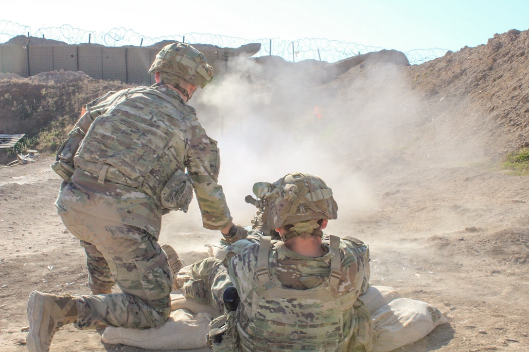 Soldiers from 1st Battalion, 125th Infantry Regiment, 37th Infantry Brigade Combat Team, crew a M2 Browning machine gun in eastern Syria, Dec. 31, 2022. Soldiers must maintain and test their equipment frequently and with dedication, enabling them to be ready to respond to any threat, anywhere, any time. (U.S. Army National Guard photo courtesy of Capt. David Kennedy)