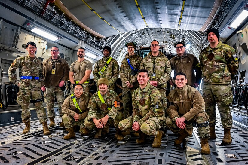 U.S. Air Force Airmen assigned to the 305th Air Mobility Wing perform various tasks for the first-ever Multi-capable Airman Rodeo at Joint Base McGuire-Dix-Lakehurst, N.J. on Dec. 14, 2022. The 305th Aerial Port Squadron hosted the event where three teams of “Port Dawgs” intermixed with Maintainers competed in a timed bare tine upload of a single pallet, followed by a rolling stock upload of a 10K All Terrain Materials Handling Forklift. The foundation of a rodeo has been around in the Air Mobility sphere for more than 40 years and its purpose has remained the same, to test our readiness capabilities in a competitive environment.