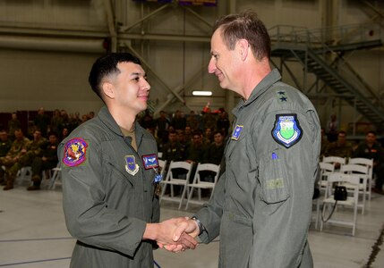 A photo of an Airman receiving a medal.